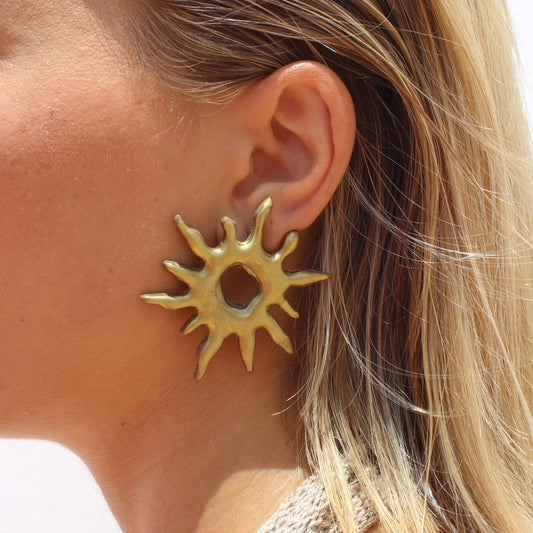 pendentes dorados con forma de sol